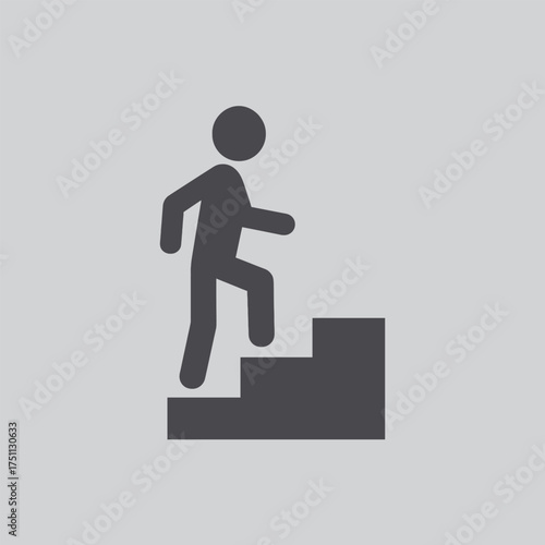 Simple black silhouette of a person climbing a set of stairs