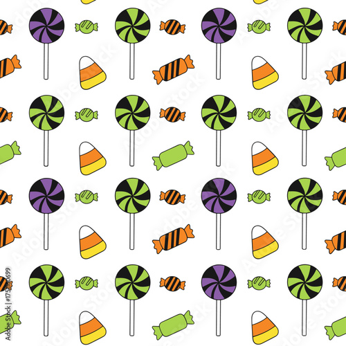 Seamless candy pattern for Halloween featuring candy corn, lollipops, and sweets