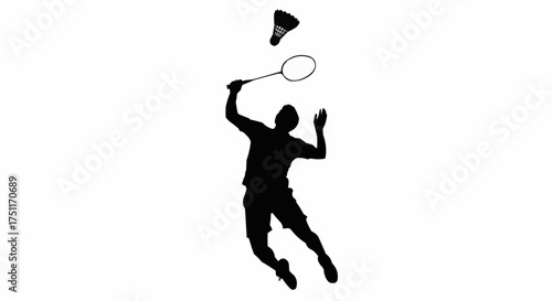 Dynamic badminton player hitting shuttlecock with powerful overhead smash