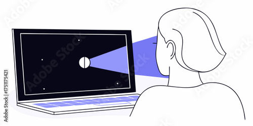 Person Glaring at Laptop Screen in Dark Room, Eyes Strained from Computer Use
