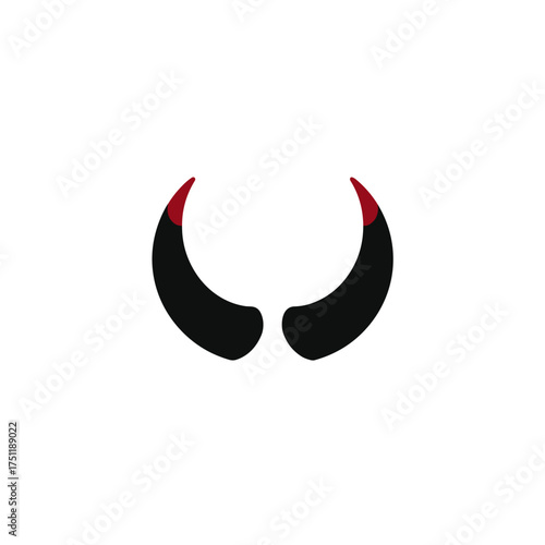Curved black devil horns with red tips representing gothic halloween mischief and dark symbolic art