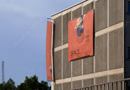 Mockup of Blank poster and fly banner in a building facade