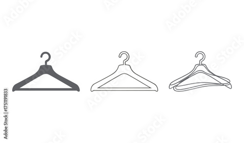 A set of three grey clothing hangers in different styles on white background garment hanger clothes hanger