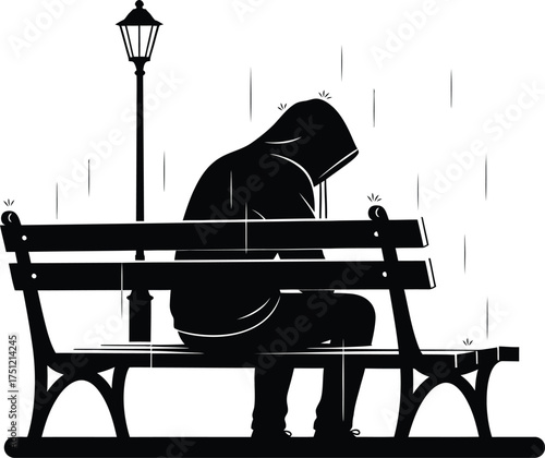Silhouette of a person wearing a hood sitting alone on a park bench in the rain