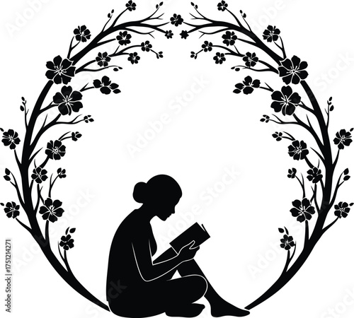 Silhouette of a woman reading a book framed by a circular floral cherry blossom branch design