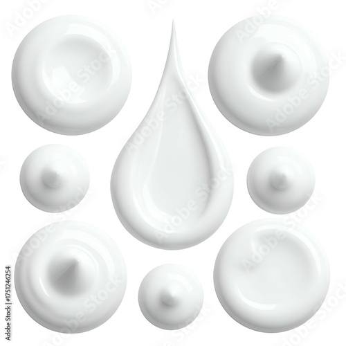 Close-up of white cosmetic cream swirls, droplets, and dollops on a black background