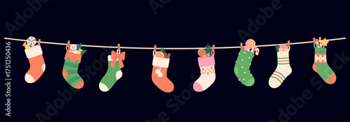 Christmas socks on rope. Fabric cotton wool sock with different gifts and sweets. Winter holidays decoration elements, candies and plants, vector design