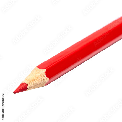 Sharp, red writing tool with a visible wood core, isolated on a black background
