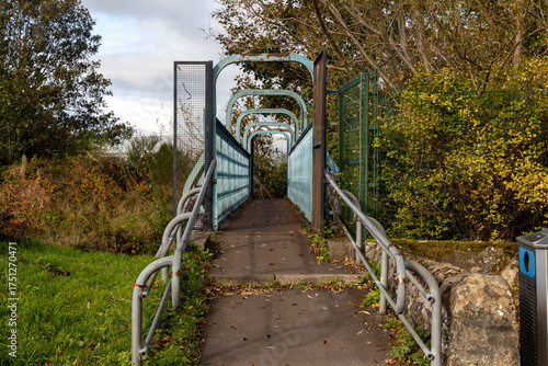 Pedestrian Footbridge Over the River Allan at Bridge of Allan Scotalnd in Autumn
