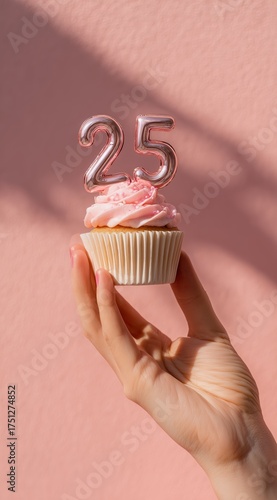 Celebrating Twenty-Five Years With a Pink Cupcake and a Shimmering Candle