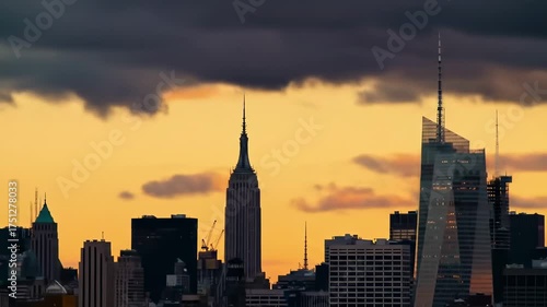 Urban skyline silhouette against a golden sunset sky, perfect for backgrounds