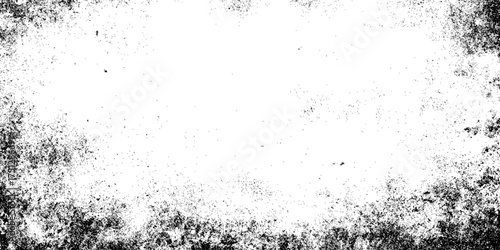 Black and White Grunge Dust Texture with Fading Specks Overlay.