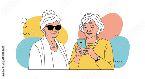 Two older women looking at a smartphone together.