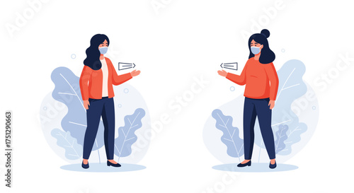 Two people in masks maintaining distance from each other.