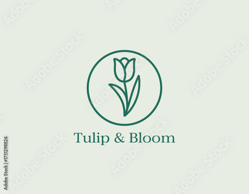This minimalistic logo represents Tulip & Bloom, featuring a delicate flower design that conveys beauty and elegance for a floristry brand.
