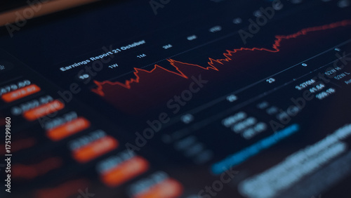 Stock market screen showing price drop graph.