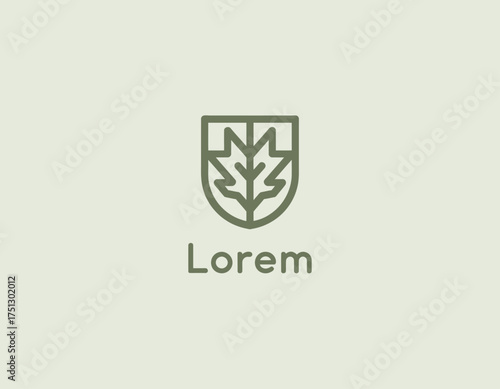 This image showcases a sophisticated logo with a leaf crest design, perfect for brands focusing on sustainability, gardening, and nature-related services.