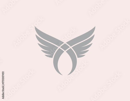 Photography This image displays a chic logo design featuring stylized wings in silver, symbolizing freedom, aspiration, and the transcendence of ideas through a minimalist approach