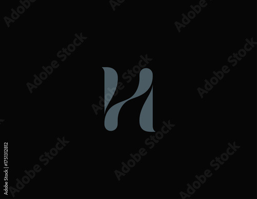 This luxurious logo design features a stylized letter 'H' set against a sleek dark background, representing elegance, sophistication, and modern branding solutions.
