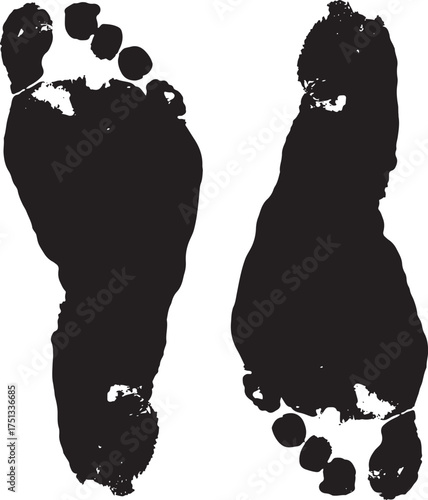 Black silhouette of two bare human footprints on a white background