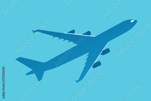 Silhouette of a plane flying in the blue sky above