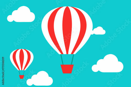 Hot air balloons floating in the blue sky with clouds