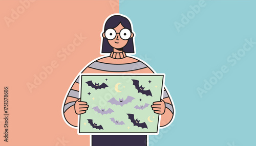 A smiling person holds a sign with cute bats moons and stars for Halloween or night themes