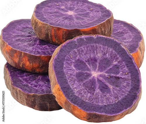 Stacked purple sweet potato slices, showing vivid concentric patterns inside