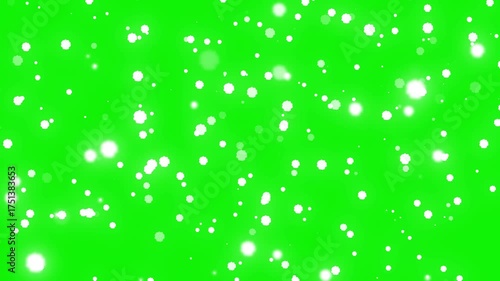Bright Sparkling Snow Particles Floating Animation in a Soft Green Background with Ethereal Glow Effects