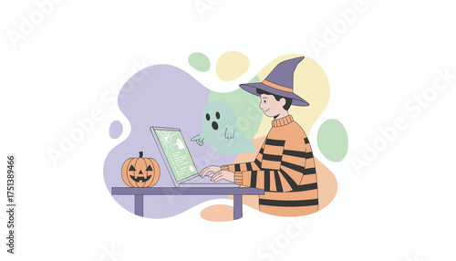 Person in witch hat working on laptop with Halloween ghost and pumpkin decoration
