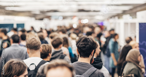 Tableau sur toile Abstract blurred people at exhibition hall of expo event trade show