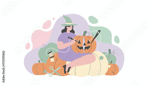 Joyful witchhatted woman crafting a Halloween jackolantern from pumpkins
