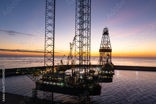 Wallpaper Mural Aerial view of offshore jack up rig in a shipyard during sunset for oil and gas exploration and production. Torontodigital.ca