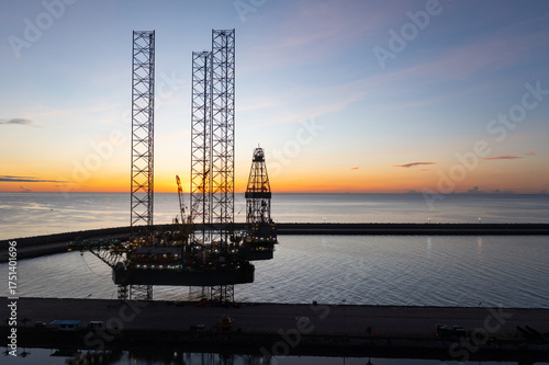 Wallpaper Mural Aerial view of offshore jack up rig in a shipyard during sunset for oil and gas exploration and production. Torontodigital.ca