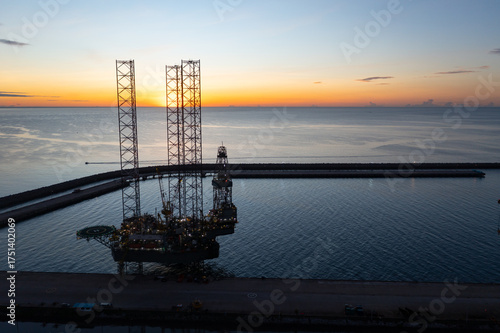 Wallpaper Mural Aerial view of offshore jack up rig in a shipyard during sunset for oil and gas exploration and production. Torontodigital.ca
