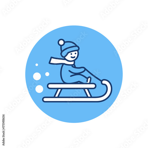 Child sledding on a winter day with a smile in blue background  