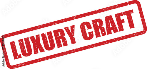 Grungy rectangular rubber stamp impression showcasing the prominent text LUXURY CRAFT set on an upward slant