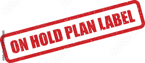 Red speckled rubber stamp with ON HOLD PLAN LABEL signifying a temporary halt in strategy