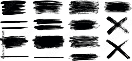 Collection of various black brush stroke elements and crosses, isolated on a white background, perfect for design and artistic projects
