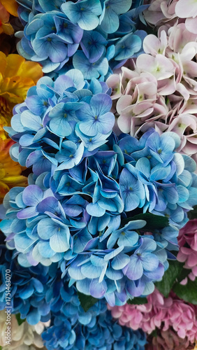 roses, peonies, hydrangeas, designer composition of artificial flowers, floral background in retro style
