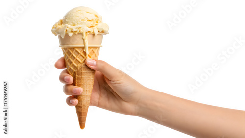 Hand holding a vanilla ice cream cone with melting ice cream against a plain black studio background on transparent background