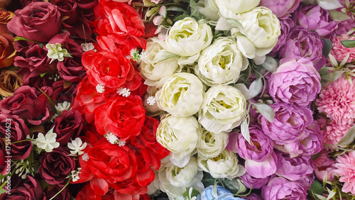 roses,designer composition of artificial flowers, floral background in retro style