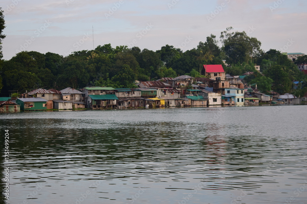Fototapeta premium Rangamati City by Kaptai Lake in Rainy Season — Misty Hills, Monsoon Clouds, and Serene Beauty of Bangladesh