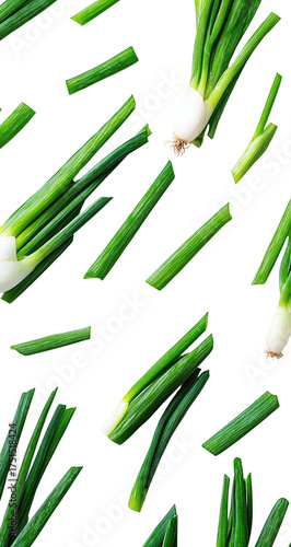 Green onions, diagonally scattered across a black background