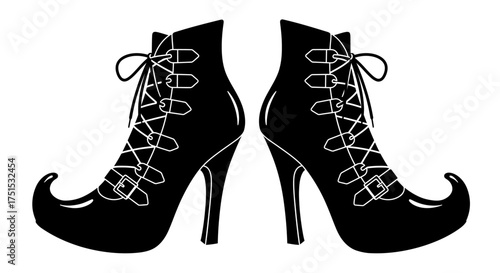 Black witch shoes with laces and pointed toes, facing each other.