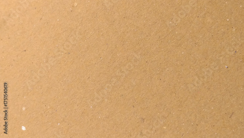 Background of brown kraft paper or cardboard texture. Abstract pattern of beige rough carton, old paper sheet, 