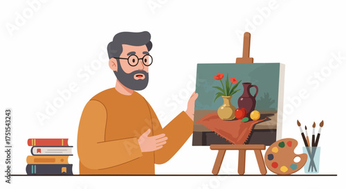Male artist with beard and glasses showcasing a still life painting on an easel, surrounded by art supplies, books, and creative tools, ideal for art education concepts.