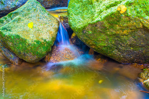 Water Flowing in the forest Waterfall, Thailand.