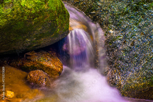 Water Flowing in the forest Waterfall, Thailand.