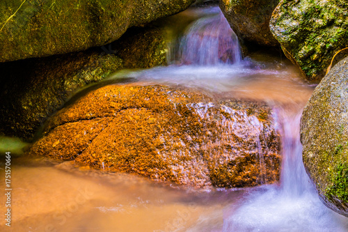 Water Flowing in the forest Waterfall, Thailand.